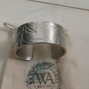 Silver cuff.. very intricate.. sturdy.. beautiful.